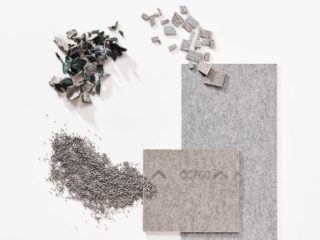 Recycled carpet materials shown as raw fragments, granules, and finished tile samples on a white background.